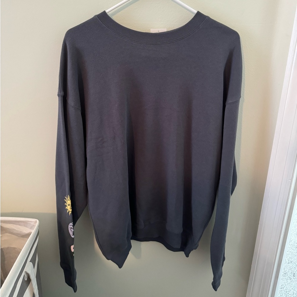 Long sleeve sweater with sun and moon design